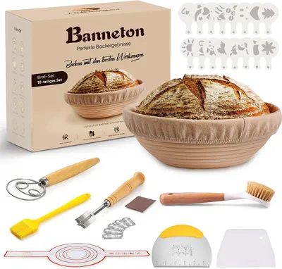 A collection of baking tools and bread baskets, with a box in the background.