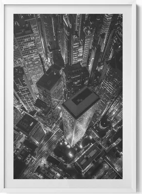 Produktbild von Großstadt bei Nacht aus der Vogelperspektive– Wandbild mit Rahmen – Gerahmtes Bild  – Wanddekoration – 70x100 cm –  Weiß Rahmen
