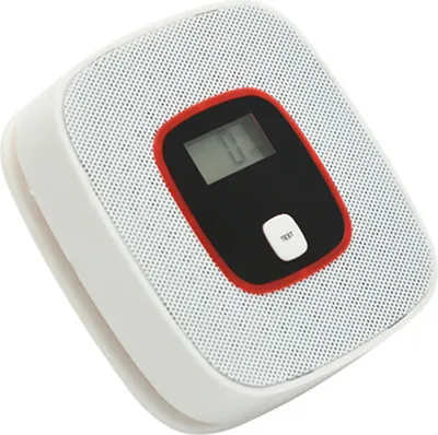 A white smoke and carbon monoxide detector with a digital display and a test button.
