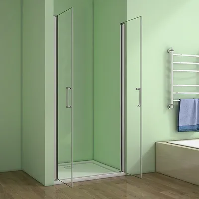 A bathroom scene with a shower enclosure, towel rack, and bathtub.