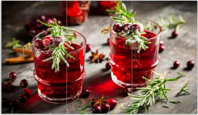 Produktbild von Wallario Herdabdeckplatte aus Glas, Größe 90 x 52 cm 3-teilig, Motiv Winterlicher Cranberry-Punsch mit Rosmarin