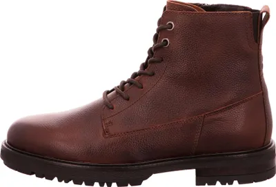 A side view of a brown leather boot.