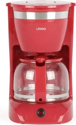 A red coffee maker is shown from the front on a white background.