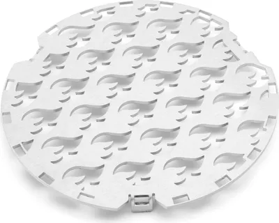 A white metal grill insert with a repeating flame-like pattern, shown from a slightly elevated diagonal angle on a white background.