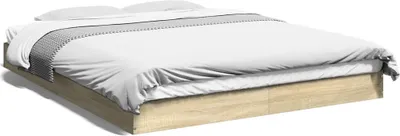 A bed frame with white bedding.