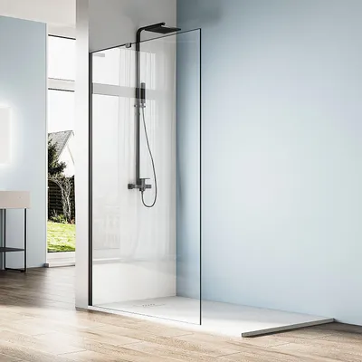 A modern bathroom with a walk-in shower.