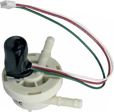A close-up studio shot of a white and black electronic component with wires.
