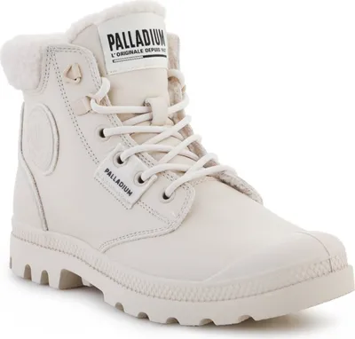 A single white Palladium boot is shown against a white background.