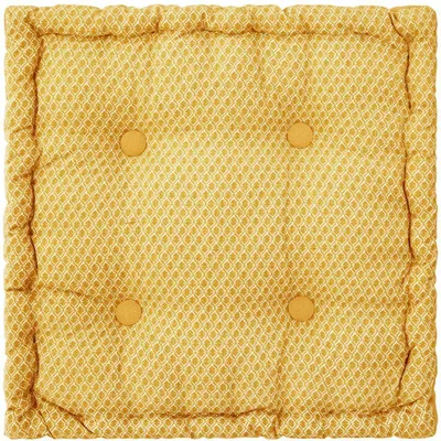 A square floor cushion with a geometric pattern and tufted buttons.