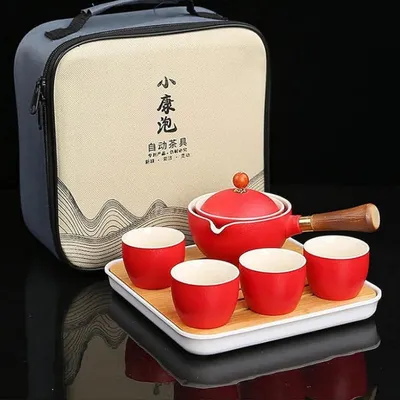 Productafbeelding van Keramische reisthee-set met theepot (360°), 4 kopjes, dienblad en tas, kleur rood