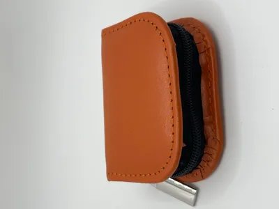 Produktbild von Hausapotheke 10 Globuli Gläser Leder (ohne Gläser) | Mini | OMEO® orange