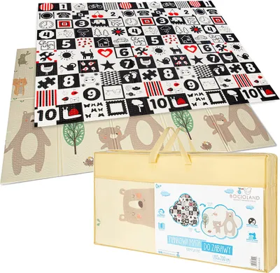 A folded playmat with a patterned side and a bear-themed side, presented with its carrying bag.