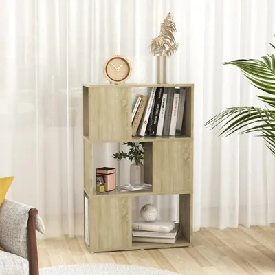A wooden bookshelf filled with books and decorative items, placed in a room with sheer curtains and a plant.