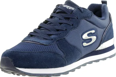 A close-up, studio shot of a single navy blue Skechers sneaker against a white background.