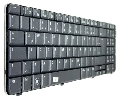 A close-up, angled view of a black laptop keyboard.