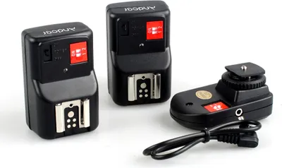 Obrázek produktu pro PT-04GY 4 kanály bezdrátového dálkového spouštění blesku Speedlite Universal - s 1 vysílačem a 2 přijímači pro Canon Nikon Pentax Olympus