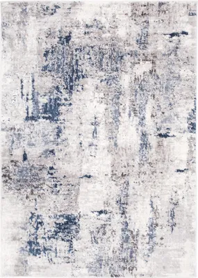 A close-up view of a rug with an abstract pattern.