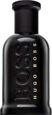 A black bottle of Hugo Boss perfume is shown against a white background.