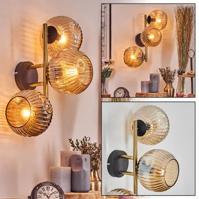 Produktbild von Villamare Wandlampe aus Metall/Riffelglas in Schwarz/Gold-/Bernsteinfarben