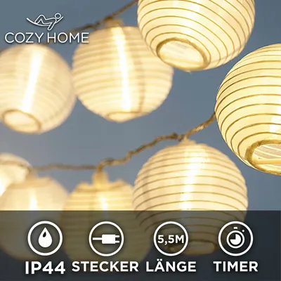 Produktbild von LED Lampion Lichterkette - 5,5 Meter | Mit Netzstecker NICHT batterie-betrieben für außen und innen | 15 LEDs warm-weiß | Kein lästiges austauschen der Batterien |IP 44 (für draußen geeignet)| LED Lampions von CozyHome