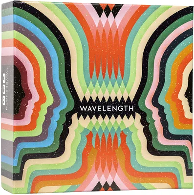 The image shows the box for the board game Wavelength, featuring a colorful, abstract design of human profiles facing each other.