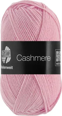 A ball of pink yarn with a black label.