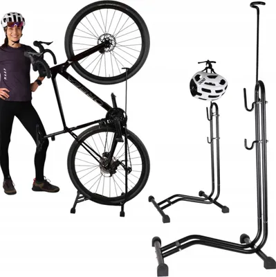 A woman is standing next to a bicycle mounted on a stand. There are also separate images of bicycle stands and a helmet.