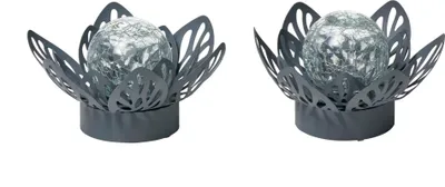 Two decorative solar-powered garden lights shaped like water lilies with glass spheres.