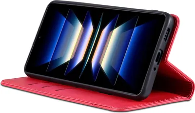 A red flip case for a smartphone is shown standing upright, displaying the phone's screen.
