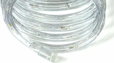A coiled LED light strip on a white background.
