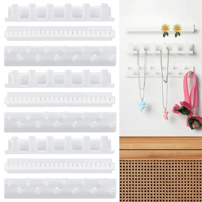Produktbild von 9 Stück selbstklebende Wandhalterungen für Schmuck