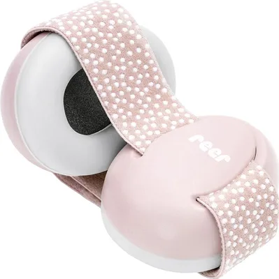 A pair of pink baby earmuffs with a white polka dot pattern on the headband, shown against a white background.