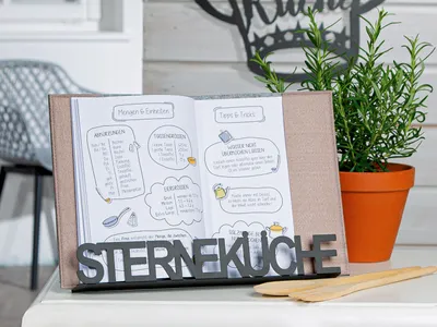Imagen del producto de Gilde Kochbuchhalter, Sterneküche, Schriftzug, Sternmotiv, Metall, schwarz, VE 2 Höhe: 22.50 cm Breite: 30.00 cm Tiefe: 4.50cm 69372