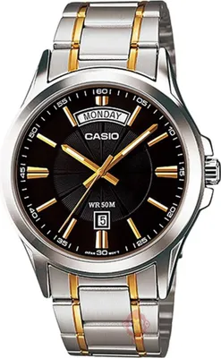 A close-up studio shot of a men's Casio watch with a black dial, silver and gold band, and day/date display.
