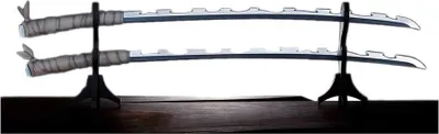 Two swords displayed on a stand on a wooden surface.