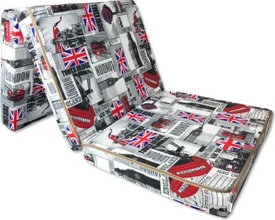 A folded mattress with a London-themed print.
