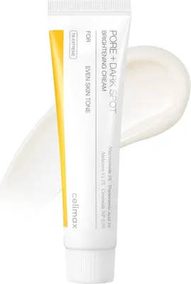 A tube of Celimax Pore+ Dark Spot Brightening Cream with a dollop of cream next to it.