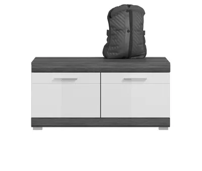 A bench with two drawers and a backpack on top, isolated on a white background.