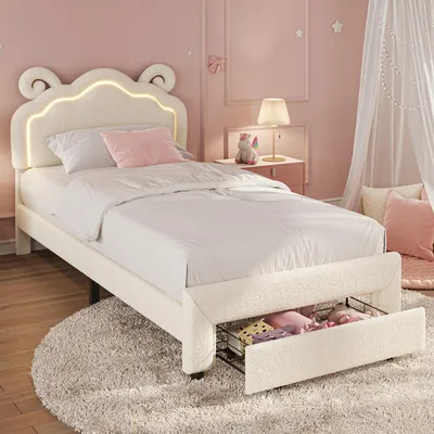 Imagen del producto de Cuna REMZETTA de 90 x 200 cm con función de ajuste de altura, iluminación LED y revestimiento de bouclé, estructura acolchada para el dormitorio infantil