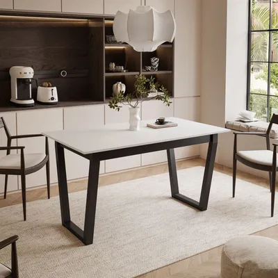 A dining table set in a modern kitchen or dining area.