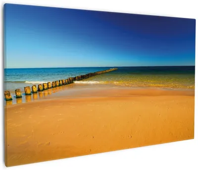 Produktbild von Wallario Premium Leinwandbild Sandstrand in orange - Blaues Meer - Blauer Himmel in Größe 60 x 90 cm