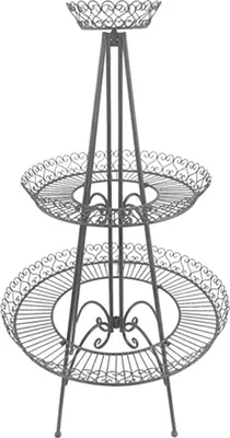 A three-tiered metal plant stand with ornate detailing.