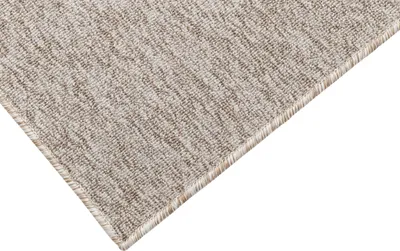A close-up view of a carpet.