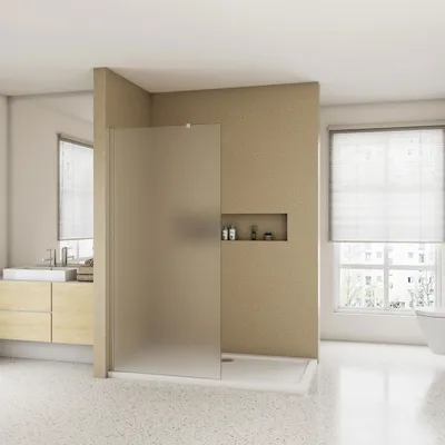 A modern bathroom with a walk-in shower, vanity, and window.