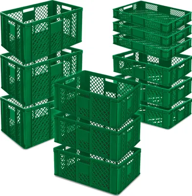 Several stacks of green plastic crates are arranged on a white background.