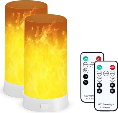 Two LED flame lights and two remote controls are displayed against a white background.