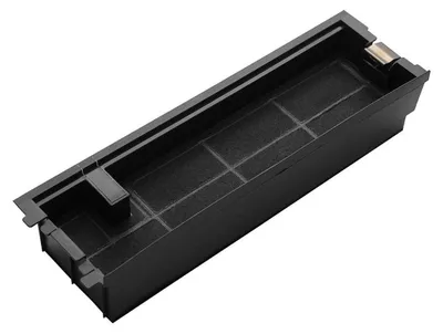 A black carbon filter for a kitchen appliance.