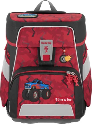 A red and black children's backpack with a monster truck design.