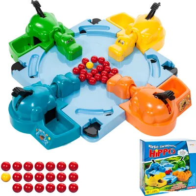 A game of Hungry Hippos with marbles and the game box.
