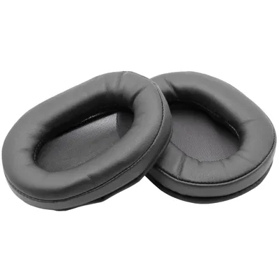 Two black headphone ear pads are shown against a white background.